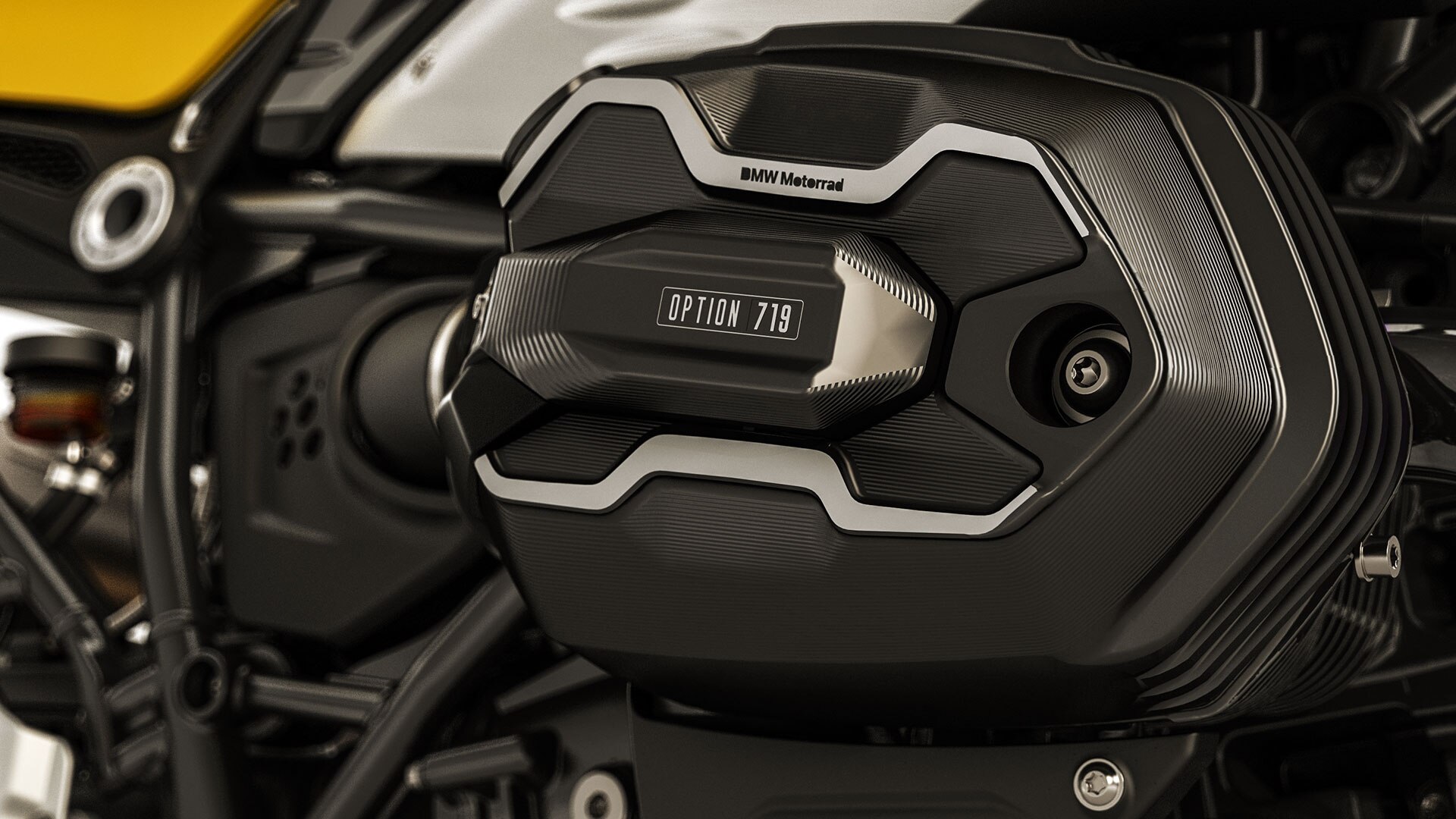 We see the yellow hand protector of the R nineT Urban G/S.